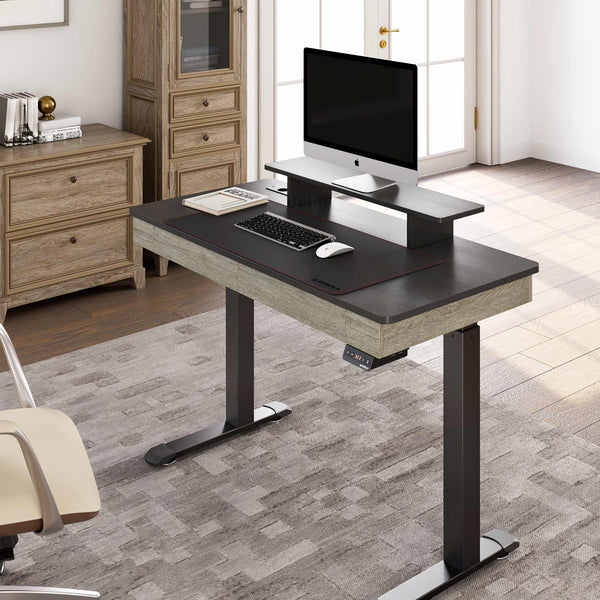 47" Standing Desk with Drawer, Black Top and Wood Finish in a Modern Commercial Office Setting.