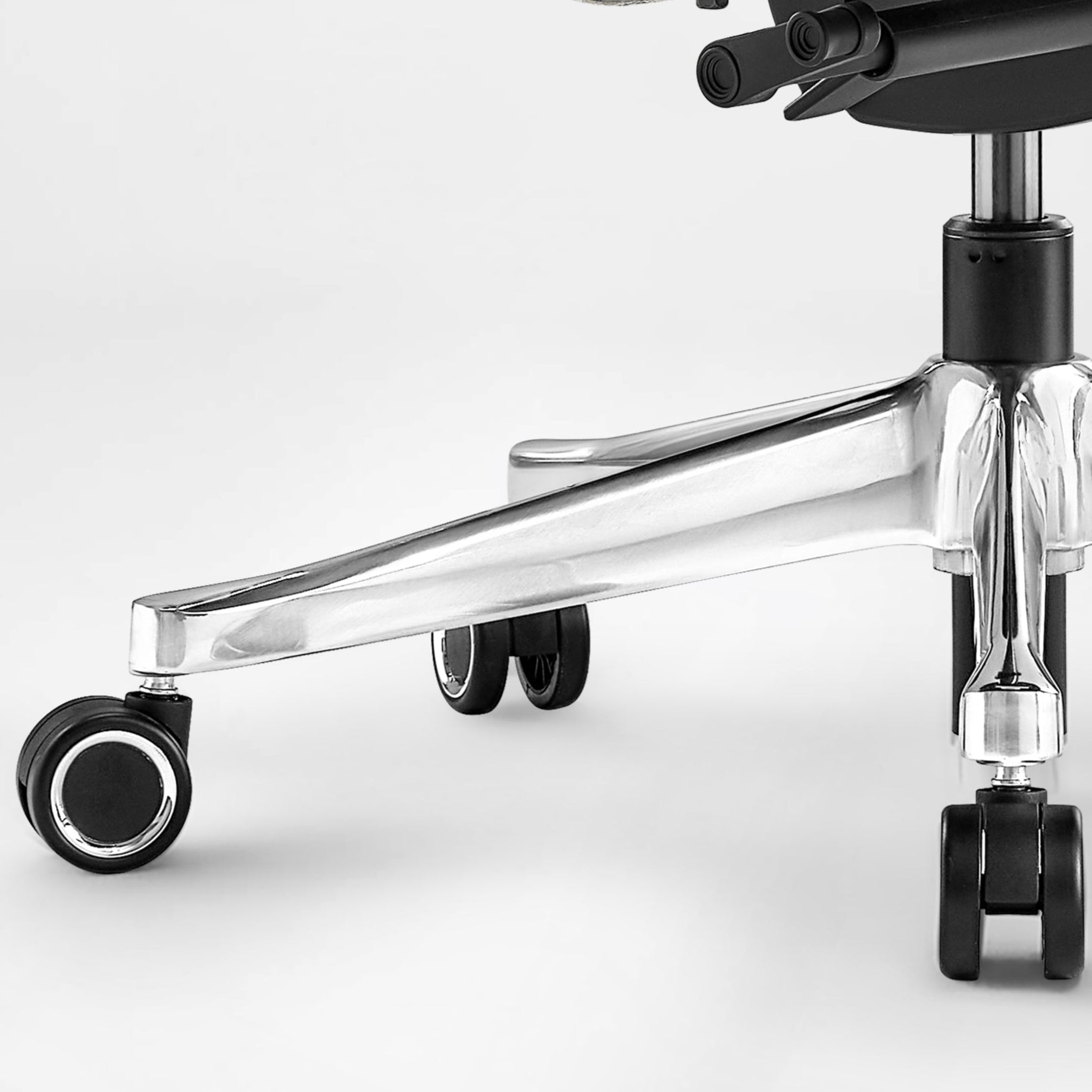 Eureka Ergonomic Serene executive chair base: polished chrome five-star base with black casters and chrome accents.