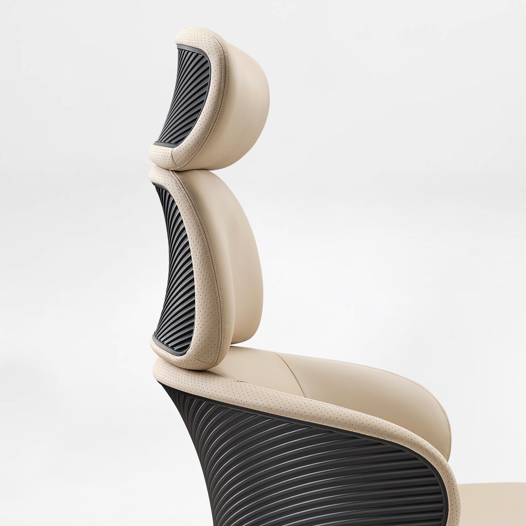 Eureka Ergonomic Royal Rowan beige microfiber leather executive chair with perforated headrest and ribbed black backrest detail.