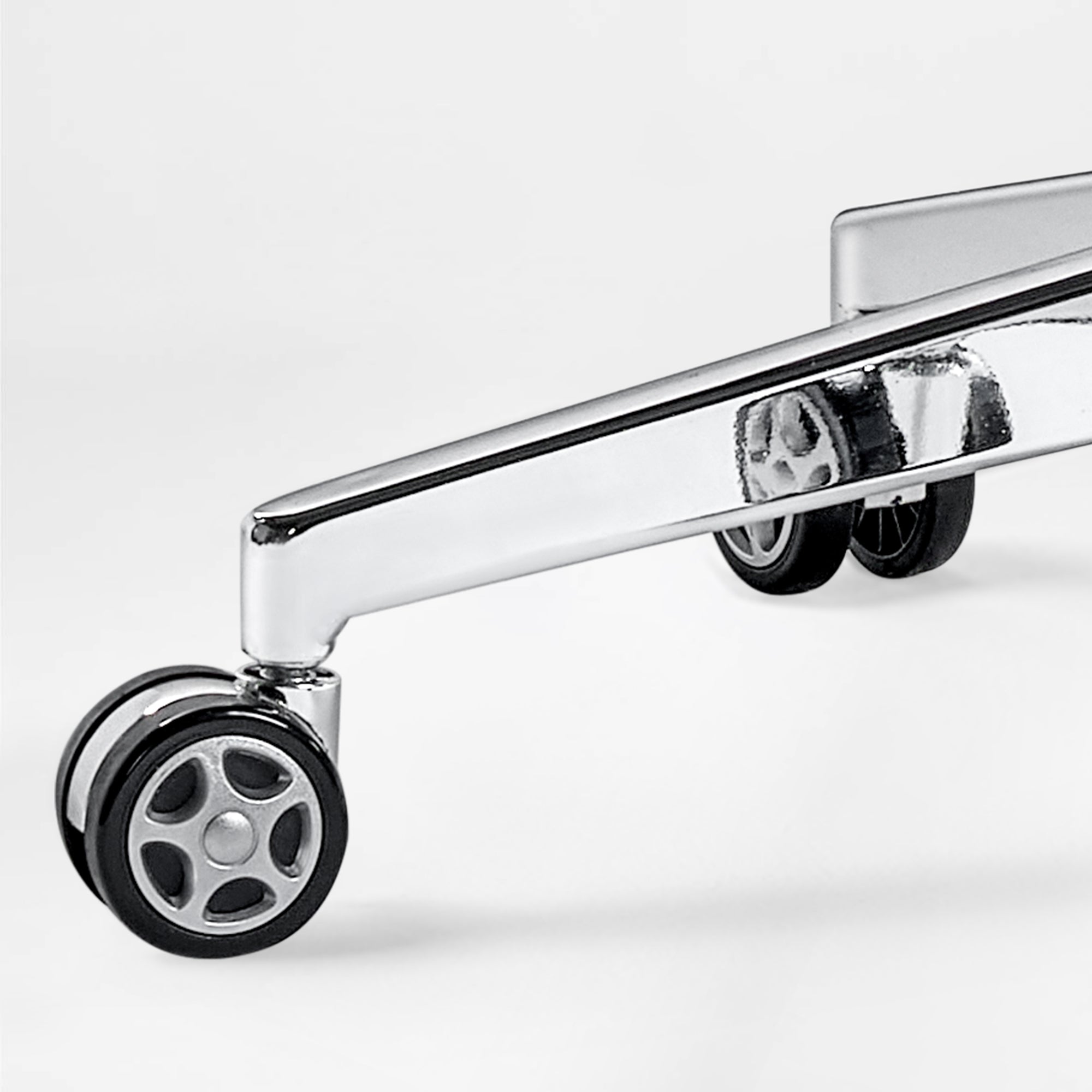 Eureka Ergonomic Royal Renee executive chair polished chrome base with dual-wheel casters for mobility.