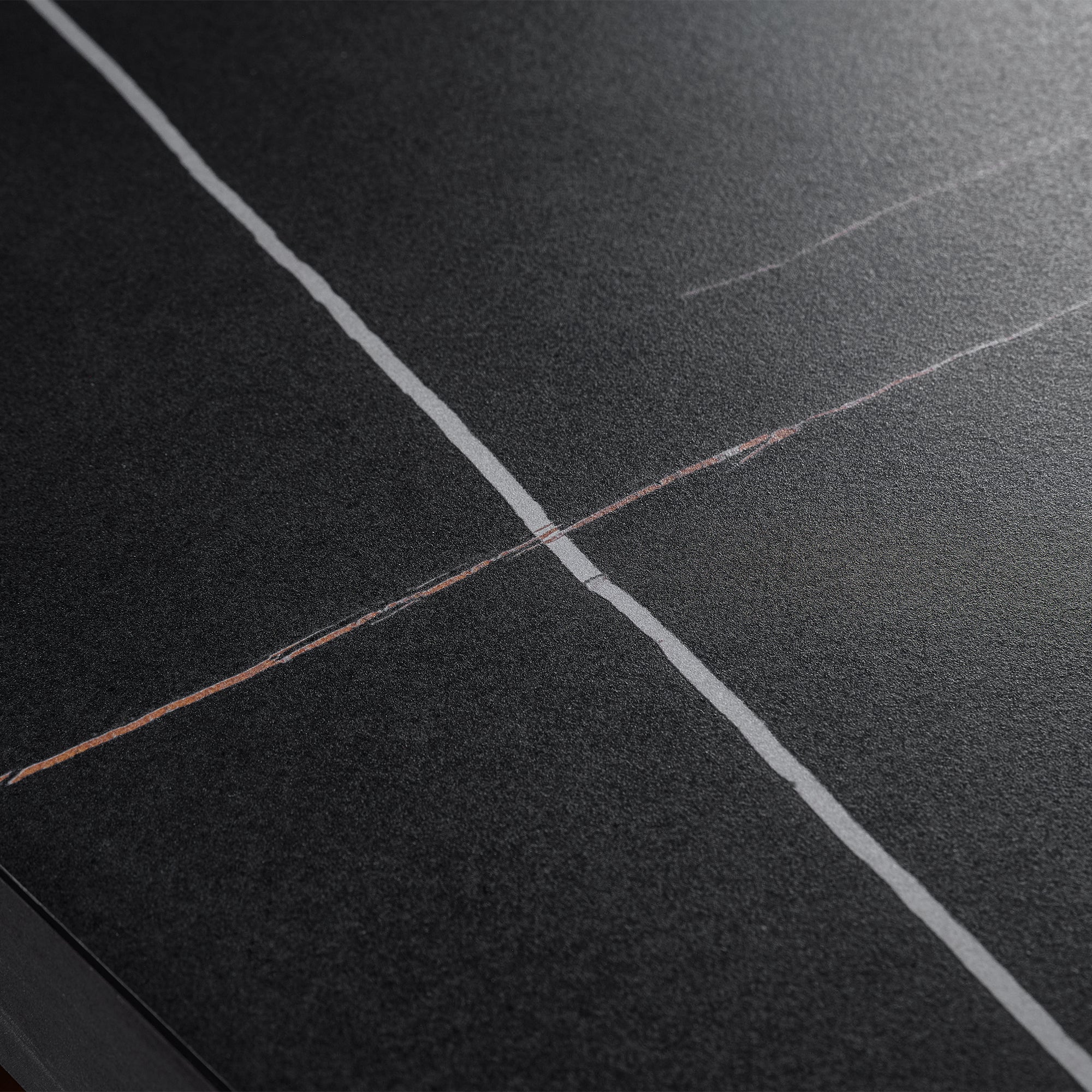 Zen Classic Executive Standing Desk Surface Detail, Black Desktop With Vein Patterns.