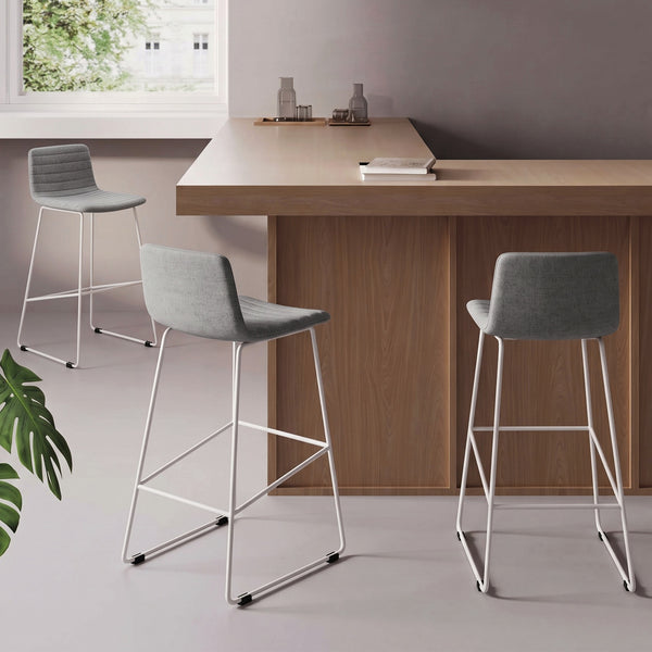 Eureka Ergonomic Topki stools around a wood kitchen island