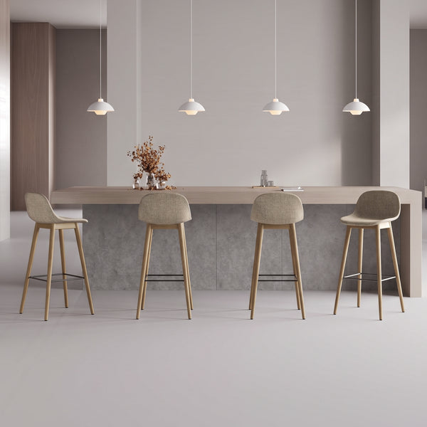 Eureka Ergonomic Perchamp stools lined along a kitchen island