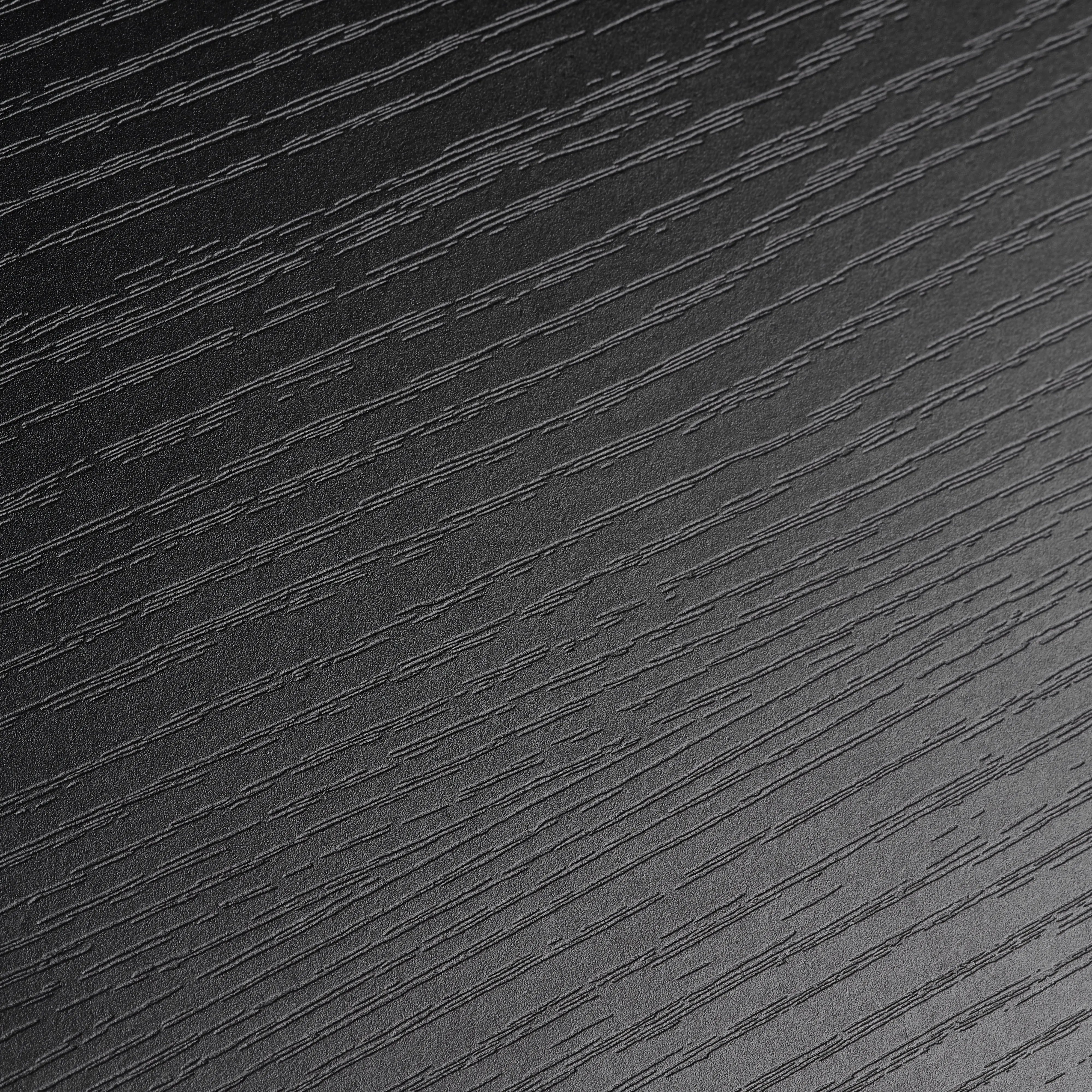 Close-Up Detail of Black Wood Grain Finish, Standing Desk Surface.