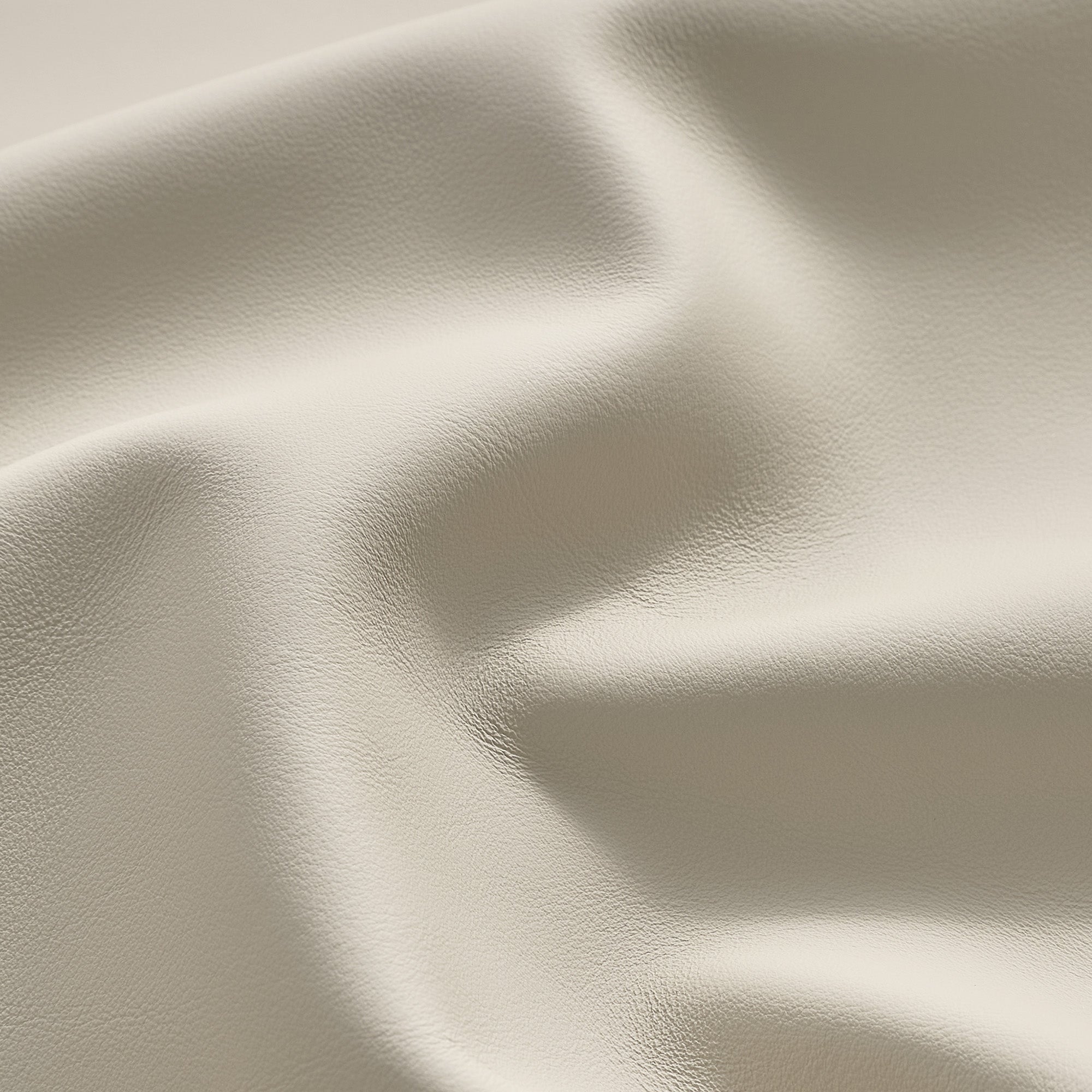 Eureka Ergonomic Cream Napa leather texture detail for Serene executive office chair, showcasing fine grain.