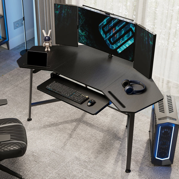 Ergonomic Gaming Desk With Pull-Out Keyboard Tray, Triple Monitors, and Black Carbon Fiber Finish.