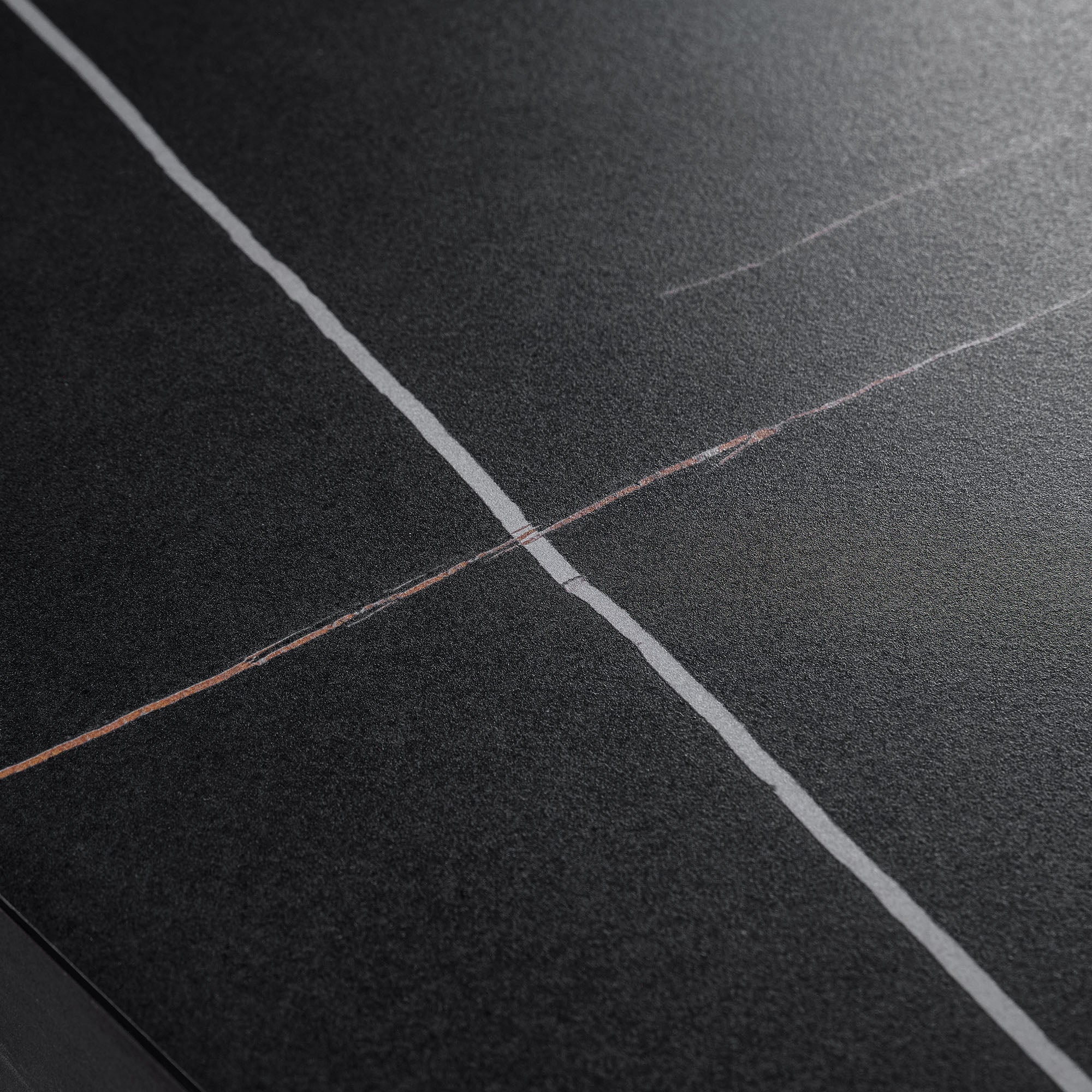Eureka Ergonomic Zen Pro Executive Desk Detail, Black Sintered Stone Top With White and Gold Veining.