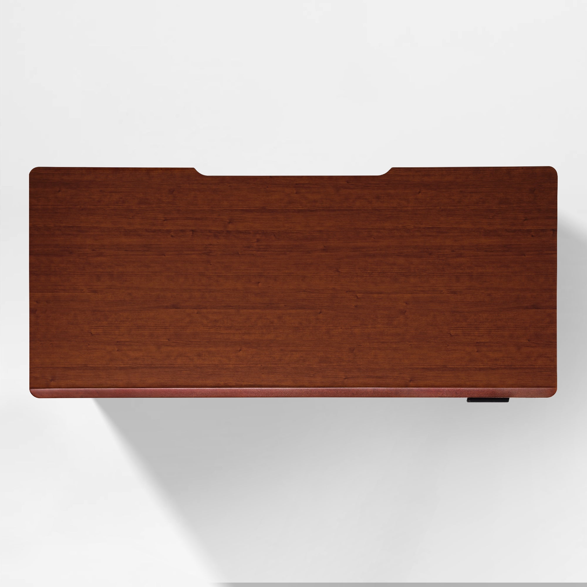 Eureka Ergonomic Overhead view of Ark Lite standing desk in dark woodgrain finish with beveled edge and cable management cutout.