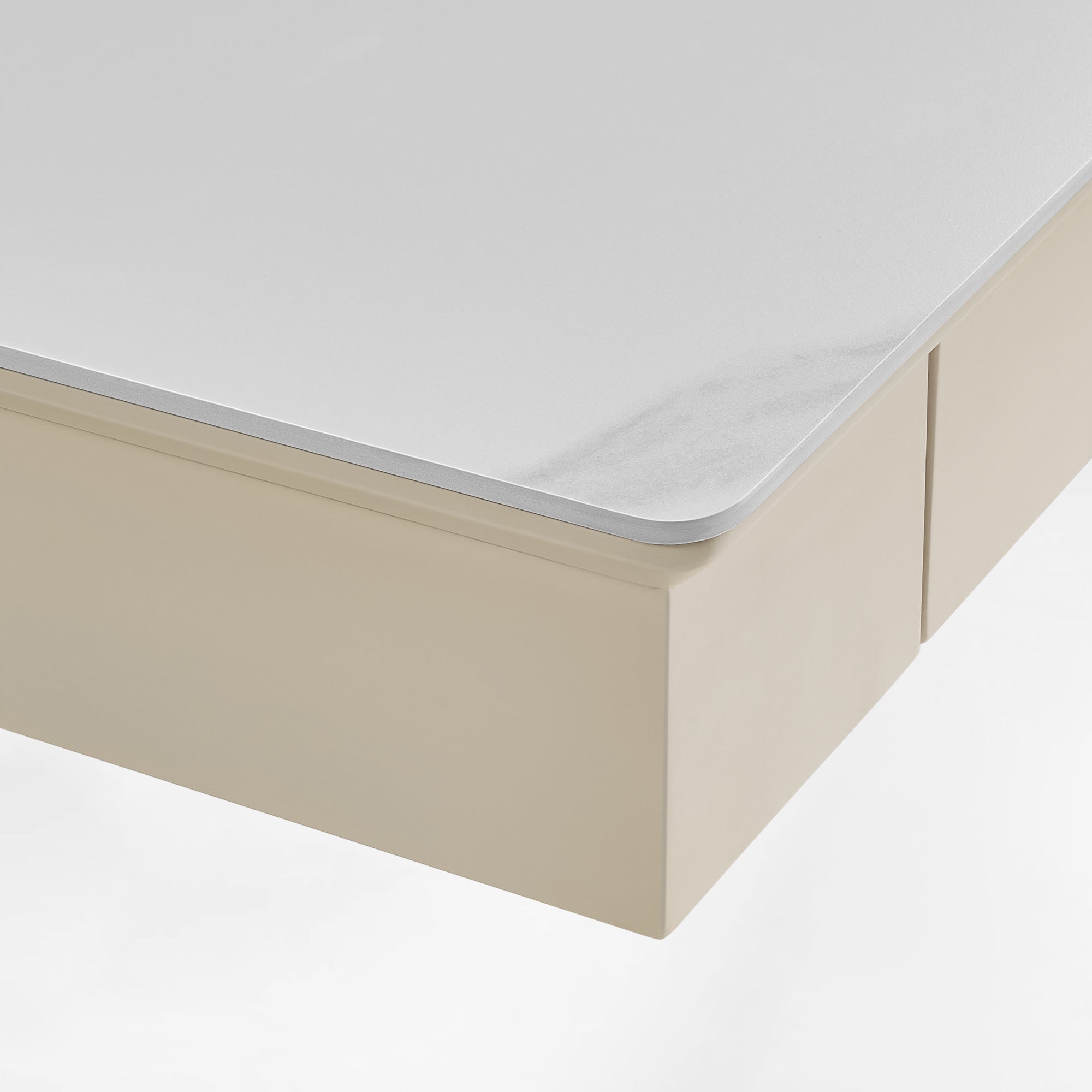 Close-up of the Ark desk’s premium white sintered stone desktop and rounded corners.
