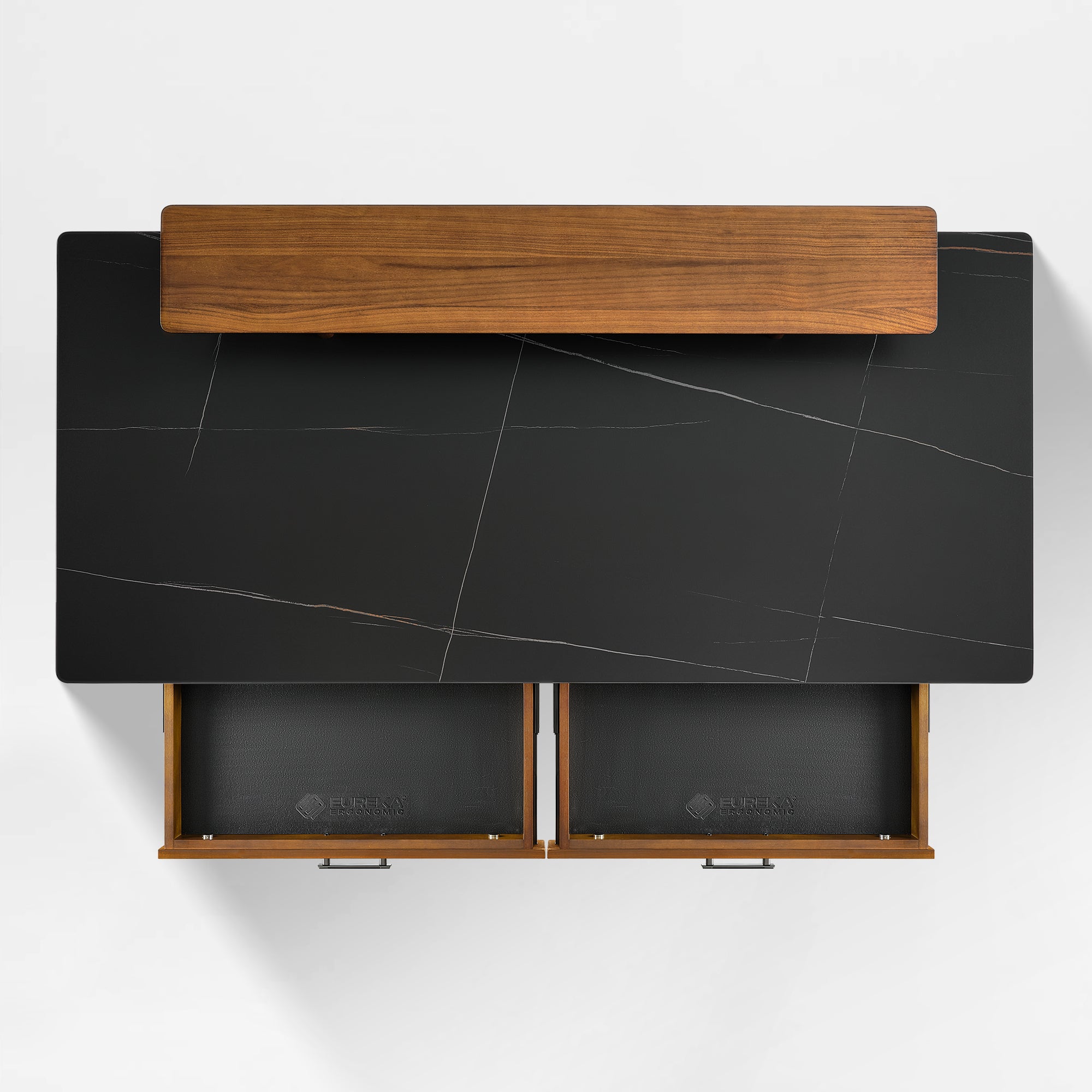 Birds-eye view of the Ark standing desk highlighting the work surface, monitor riser, and two open drawers for storage.