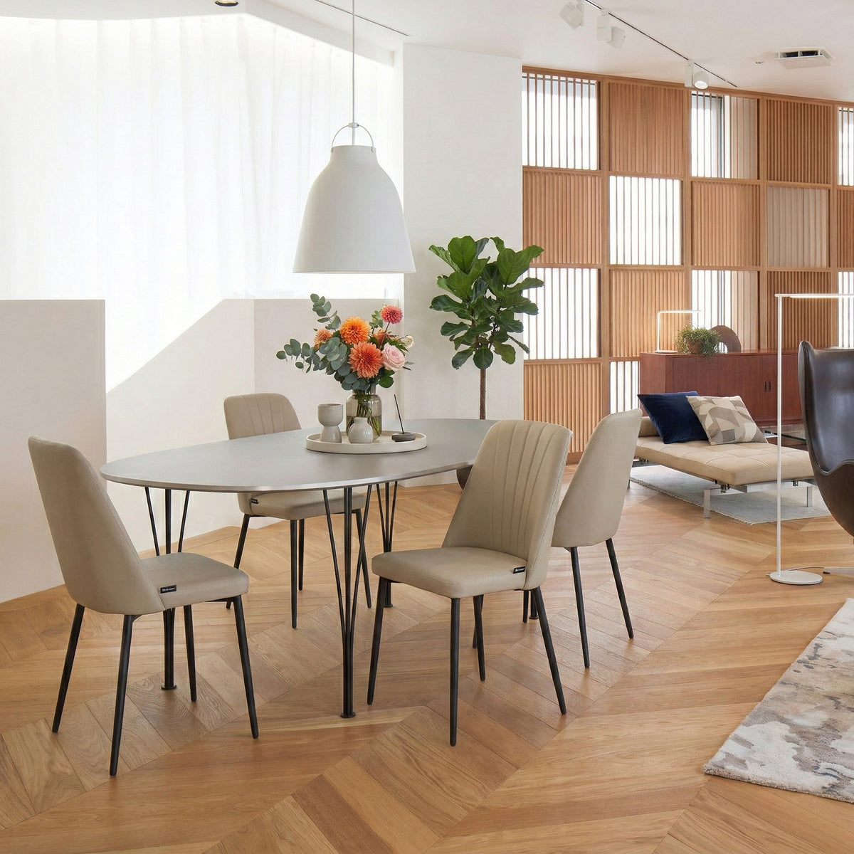 Eureka Ergonomic Chester off-white dining chairs in a modern dining room